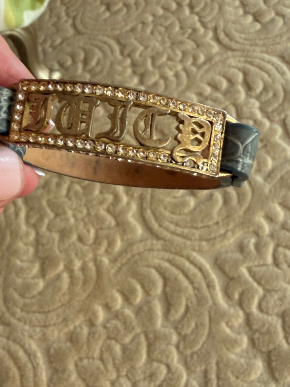 JUICY COUTURE VINTAGE Gold-tone leather and cz bracelet slate blue snap closure